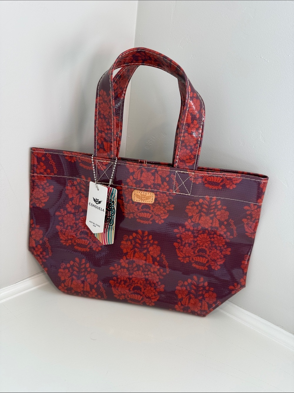 Consuela “Grab N Go” Burgundy and Red Floral Vinyl Tote